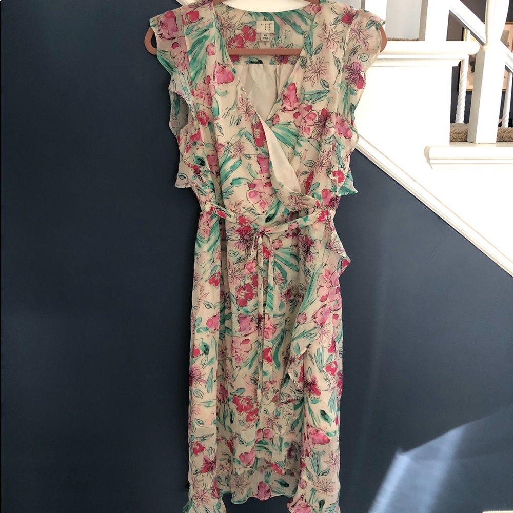 Midi length ruffle floral cap sleeve dress